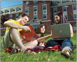 Photo: Students on the lawn outside of the Harriet Irving Library